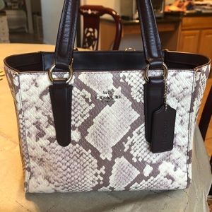 Authentic COACH handbag. Purple leopard print